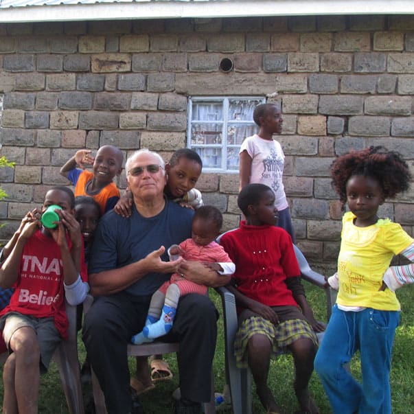 Church Elder Ken Yockey with children